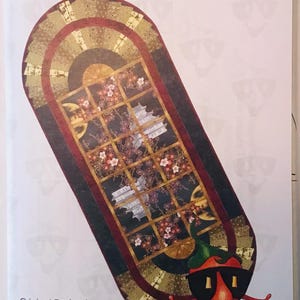 May include: A quilting pattern for a table runner titled "Inner Beauty" with a traditional Japanese design featuring a window with cherry blossoms and a pagoda. The pattern is by Chili Pepper Quilt Patterns and includes instructions for paper piecing.