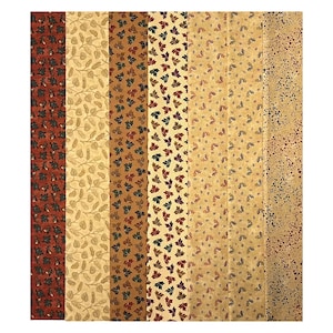 May include: A collection of fabric swatches with various autumn-themed patterns. The designs include leaf and acorn motifs in shades of red, brown, and beige. The fabrics are arranged vertically, showcasing the different patterns and colors.