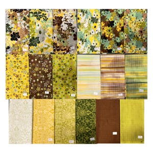 May include: A selection of fabric swatches displaying diverse floral and abstract patterns. The colour scheme features yellow, brown, green, and white hues. Some swatches have stripes or textured designs, while others present intricate floral prints.