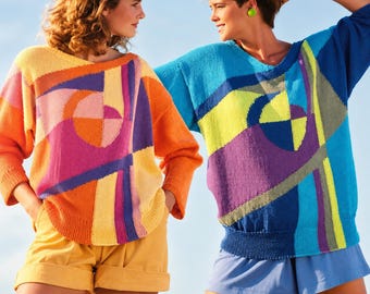 May include: Two long-sleeved knit jumpers featuring bold, geometric colour-blocked patterns. One jumper displays warm tones of orange, pink, and yellow, while the other features cool tones of blue, purple, and neon green, both with ribbed cuffs.