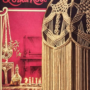 May include: Vintage book cover featuring a macrame lampshade design. The cover has the text "Lorna Rose" in pink and a red background. The bottom of the cover reads "4 Original Lampshade Designs by Sandra Dale".