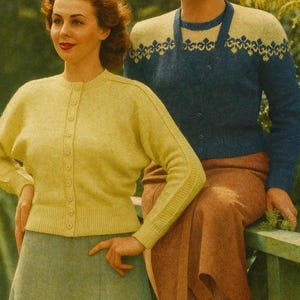 May include: Two women in vintage clothing pose outdoors. One wears a yellow cardigan and a green skirt. The other wears a blue cardigan with a yellow patterned yoke and a brown skirt. The image has a retro aesthetic.