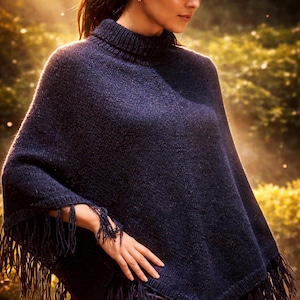 May include: A dark navy blue knitted poncho with a turtleneck and fringe detailing. The poncho is made of a soft, textured material and is suitable for cooler weather. The fringe adds a stylish touch.