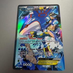 pokemon card api Team Aqua Admin - 025/034 (DCR) Uncommon main image 0