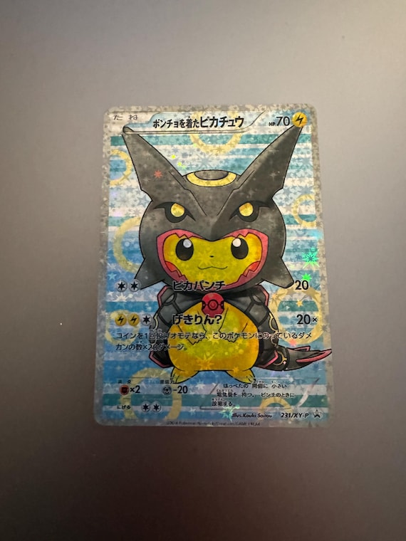 poncho pokemon cards Poncho-Wearing Pikachu Rayquaza Poncho-Wearing Pikachu Box (231) 2016 Japanese XY Promo prevent all effects of that card done to the Pokmon VSTAR or Pokmon VMAX this card is attached to Poncho Pikachu Pokemon TCG Replica