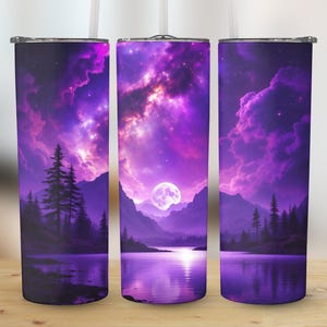 May include: Three tall, cylindrical tumblers with a vibrant purple landscape design. The design features a full moon, mountains, a lake, and a starry sky. The tumblers have a lid and a straw.
