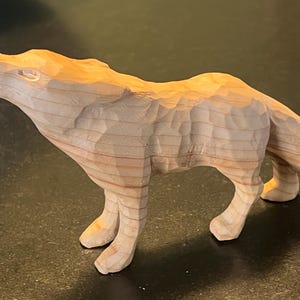 Carved wooden wolf