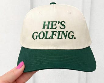 Embroidered He's Golfing Trucker Cap, Funny Golf Cap Women, Golf Tournament Cap, Golf Wife Gift for Woman, Golfer Gift