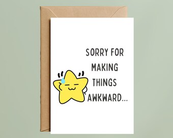 May include: A white greeting card with a brown envelope featuring a yellow cartoon star character with a blue sweat drop and the black text SORRY FOR MAKING THINGS AWKWARD. The star has a simple line-drawn face with closed eyes and a small smile.