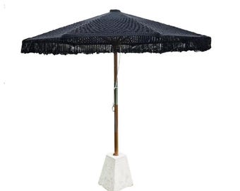 Ombrellone in macramè e teak