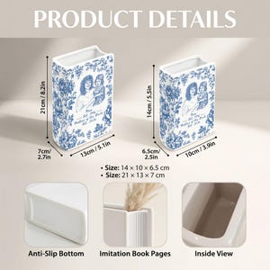 May include: Two white ceramic book-shaped vases with blue floral patterns and a custom portrait illustration. The larger vase measures 8.2 x 5.1 x 2.7 inches, and the smaller vase measures 5.5 x 3.9 x 2.5 inches. Features include an anti-slip bottom.