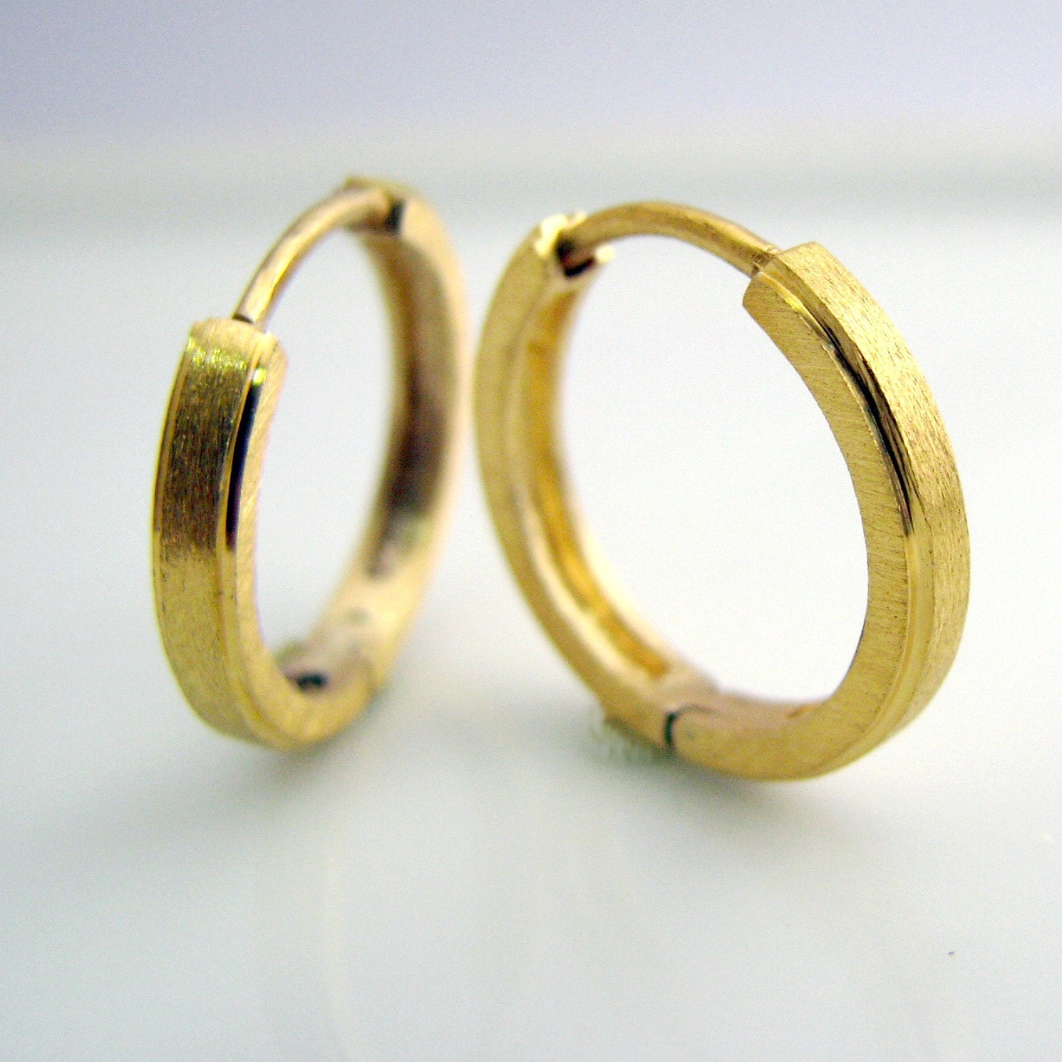 Men's single gold earrings price deals