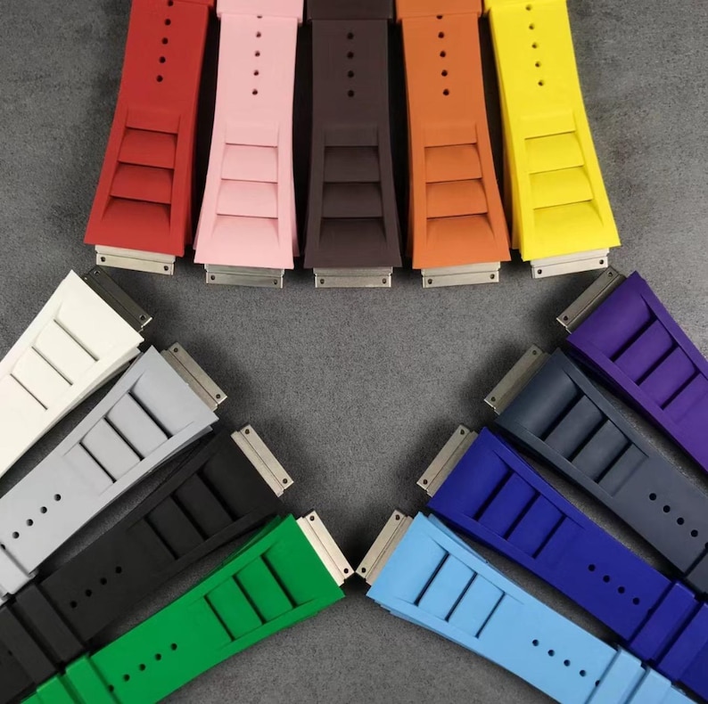 May include: A set of ten colorful watch straps, each with a different color and a unique design. The straps are made of a durable material and are perfect for adding a touch of personality to any watch.
