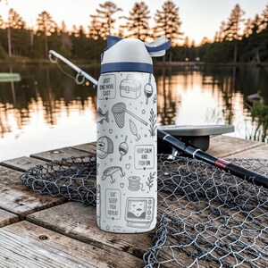 May include: A white and blue water bottle with a fishing theme. The bottle features black and white illustrations of fishing gear and the phrases "Just One More Cast", "Keep Calm and Fish On", and "Eat Sleep Fish Repeat".
