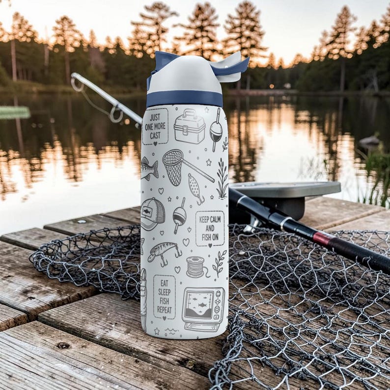 May include: A white and blue water bottle with a fishing theme. The bottle features black and white illustrations of fishing gear and the phrases "Just One More Cast", "Keep Calm and Fish On", and "Eat Sleep Fish Repeat".