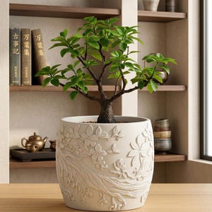 Maceta floral con relieve de sakura en 3D - Decoración elegante para el hogar
