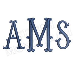 May include: A dark blue embroidered monogram featuring the letters AMS in a decorative serif font with curled terminals. The letters are stitched with a visible thread texture, creating a raised appearance against a plain white background.