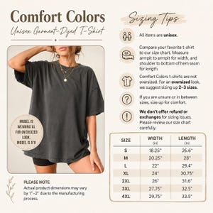 May include: A charcoal grey short-sleeve t-shirt with a crew neckline. The image includes a sizing chart with width and length measurements in inches, along with text instructions for selecting a size for an oversized look and fit.