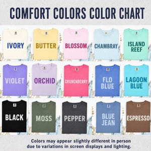 May include: A Comfort Colors color chart featuring fifteen t-shirts in various shades including ivory, butter, blossom, chambray, island reef, violet, orchid, crunchberry, flo blue, lagoon blue, black, moss, pepper, blue jean, and espresso.