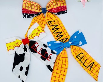 Custom personalized Toy Story, Buzz Lightyear, Woody, Jessie, Andy’s room & Buzz Lightyear fabric hair bows