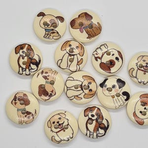May include: A selection of wooden buttons, each decorated with a charming dog design. The buttons showcase different dog breeds in various poses, with brown, black, and tan markings. The buttons are round and have two holes for sewing.