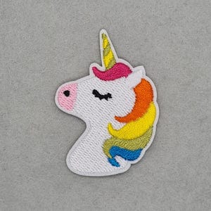 May include: Embroidered unicorn patch. The unicorn has a white head, pink nose, and black eyelashes. Its mane is a mix of orange, yellow, and blue. The horn is yellow with a white outline. Ideal for customising clothes or accessories.