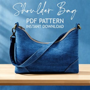 May include: A white ceramic mug with a black handle and the text "But First, Coffee" in a black, handwritten-style font. The mug is on a white surface.