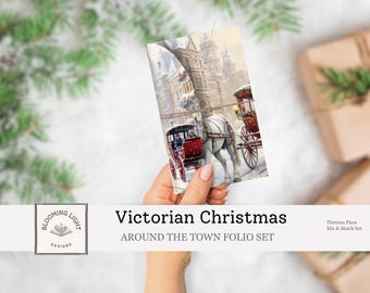 May include: A hand holds a folio set with a Victorian Christmas theme. The cover art depicts a horse-drawn carriage on a snowy street. The set includes the text "Victorian Christmas" and "Around the Town Folio Set."