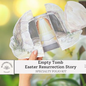 May include: A specialty folio kit with the text "Empty Tomb Easter Resurrection Story." The kit features a pop-up illustration of an empty tomb with a bright light emanating from within. The background is blurred with a cross and flowers.