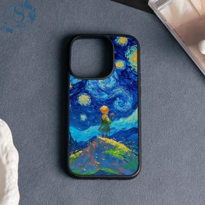 May include: Black phone case featuring a vibrant illustration of a starry night sky with a small figure standing on a hill. The artwork is reminiscent of a famous painting, with swirling blues, yellows, and greens.