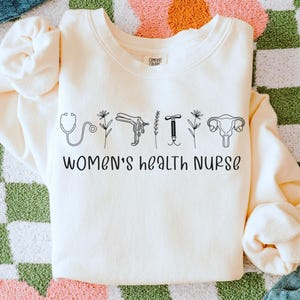 Women's Health Nurse Sweatshirt | OBGYN RN Sweater | Comfort Colors Ob Gyn Nursing Graduation Gift | Repro Clinic Jumper, Obstetrics LPN Top