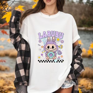 Labubu Floral Donut Shirt, Kawaii Pastel Cartoon Tee, Cute Labubu Graphic Top, Aesthetic Character T-Shirt, Gift for Labubu Fans