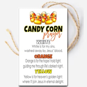 May include: A white rectangular card with a candy corn prayer. The card features cartoon candy corn characters and text that reads "CANDY CORN prayer". The card is tied with a natural twine.
