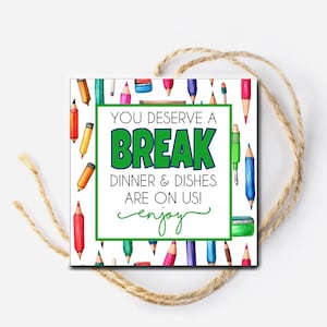 May include: A white card with a green and blue border and the text "You deserve a break. Dinner & Dishes are on us! Enjoy!" surrounded by colorful pencils.