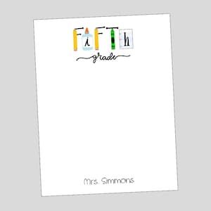 May include: A white notepad with the text "Fifth grade" and a line drawing of school supplies, including pencils, glue, a crayon, and a notebook. The text "Mrs. Simmons" is at the bottom of the notepad.