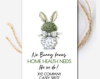 May include: A white ceramic vase with a blue and white floral pattern, topped with a green topiary shaped like a bunny with a blue and white gingham bow. The text reads: "No Bunny knows HOME HEALTH NEEDS like we do! XYZ COMPANY CASEY SPELTZ 555.1212"