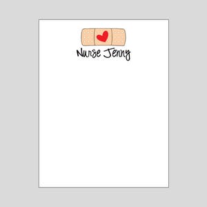 May include: A white notepad with a brown bandage with a red heart in the center. The text "Nurse Jenny" is printed below the bandage.