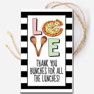 May include: A white card with black and white stripes on the border. The card says "LOVE" in large letters with a pizza slice in the "O". The card also says "Thank you bunches for all the lunches!"