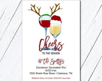May include: A Christmas party invitation with a festive design featuring two wine glasses with reindeer antlers and a Santa hat. The text reads "Cheers to the Season @ the Spettizes Saturday, December 9th 6:00 P.M. 555 River Run Road | Cordova, TN Regrets Only to Casey: 555.1212 CALL/TEXT"