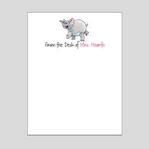 May include: A white notepad with a cartoon gray elephant with a pink nose and blue eyes. The text "From the Desk of Mrs. Hearth" is printed in black at the top of the notepad.