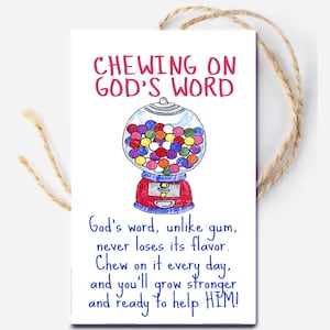 May include: A white card with the text "CHEWING ON GOD'S WORD" above a gumball machine illustration. The machine is red and blue, filled with colorful gumballs. The card has a twine string attached.