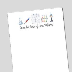 May include: White stationery with watercolor illustrations of science lab equipment, including a beaker, thermometer, lab coat, test tubes, and a Bunsen burner. The text "From the Desk of Mrs. Williams" is printed below the illustrations.
