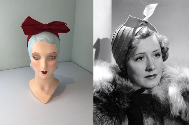 May include: A vintage-style headband with a large burgundy bow, displayed on a mannequin head with blue eyes and red lips. The image also shows a black and white photo of a woman wearing a pleated hat with a feather accent.