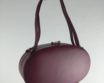 Secretly She Strolled - Vintage 1950s Burgundy Wine Leather Oval Coffin Box Handbag Purse