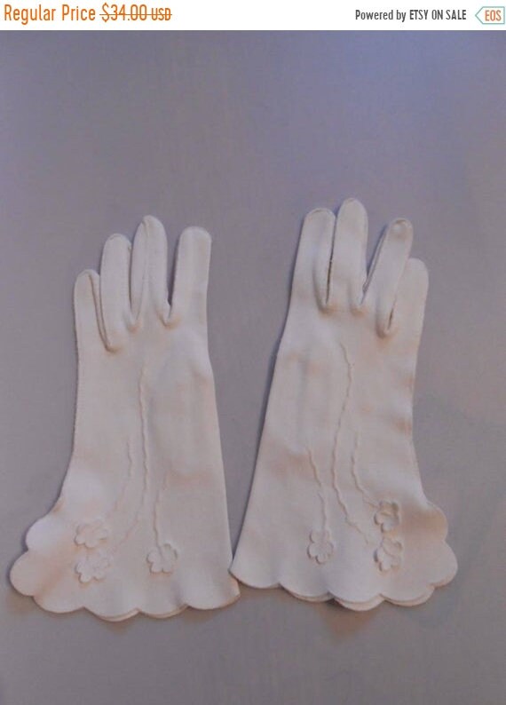 white puffy gloves