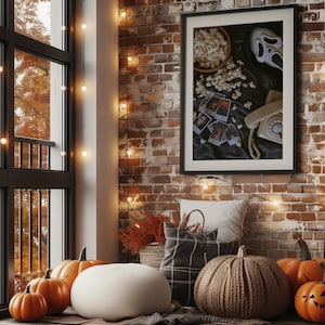 May include: A Halloween-themed room with pumpkins, a woven pumpkin, and a framed picture featuring popcorn and a Scream mask. String lights and autumn leaves add to the autumnal ambiance. A white pouf and decorative cushions complete the scene.