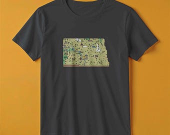 Camiseta con el mapa de Dakota del Norte / Estilo de juego de aventuras retro