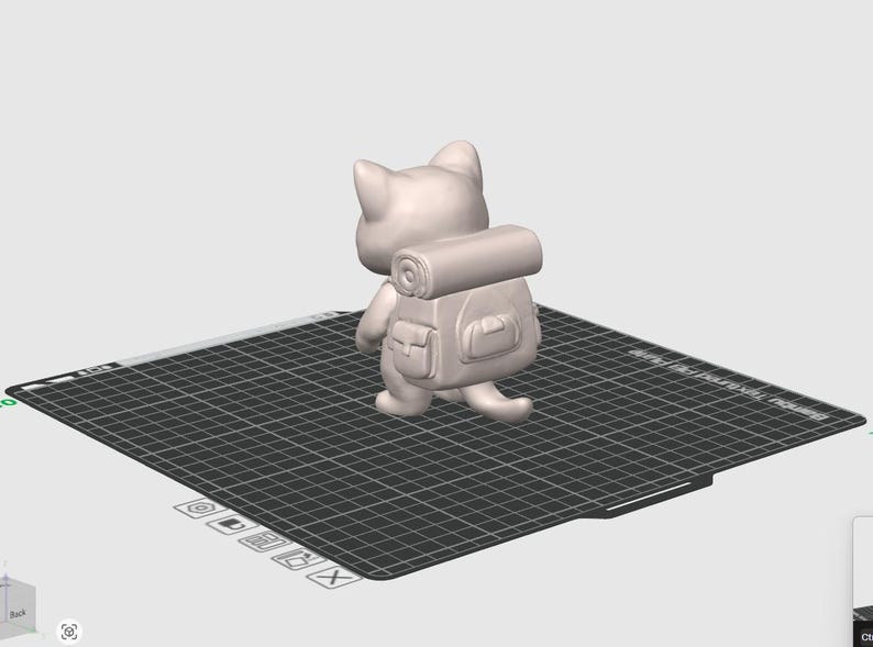 May include: A 3D-printed figurine of a cat with a backpack and a rolled-up sleeping bag. The cat is light gray and is walking on a black grid surface. The backpack has two pockets and a rolled-up sleeping bag on top.