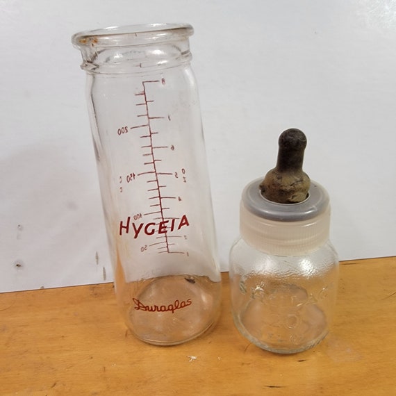 Vintage evenflo glass baby bottles 