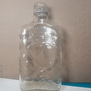 Vintage pint whiskey bottle with a heart on both sides, vintage bottles, soda bottles, antique whiskey bottle,  free shipping